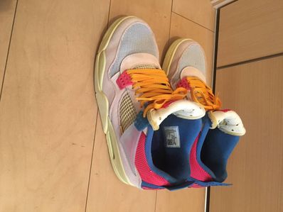 UNION × Nike Air Jordan 4 SP "Guava Ice/Light Fusion Red"