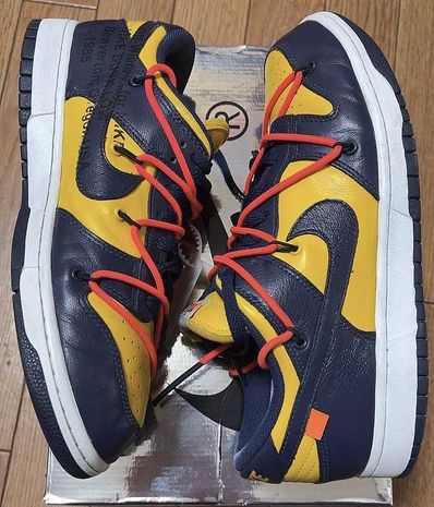 Off-White × Nike Dunk Low LTHR "University Gold/Midnight Navy/White"