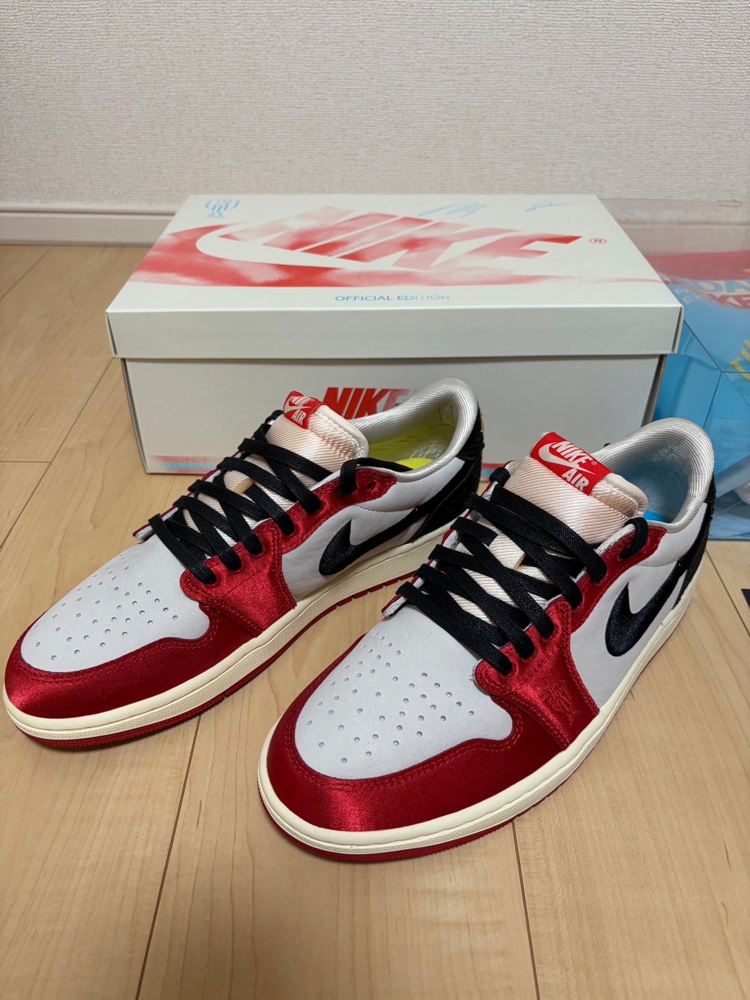 Trophy Room × Nike Air Jordan 1 Low OG "Sail and Varsity Red"