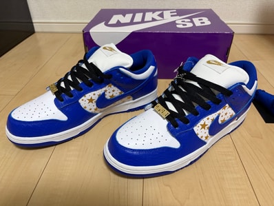 Supreme × Nike SB Dunk Low OG QS Gold Stars "White/Hyper Blue"