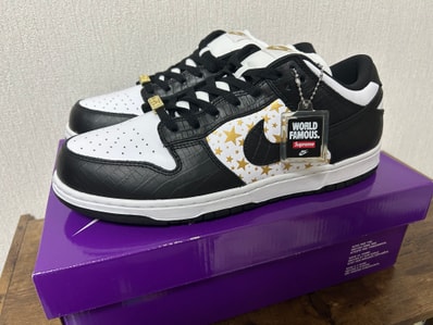 Supreme × Nike SB Dunk Low OG QS Gold Stars "White/Black"