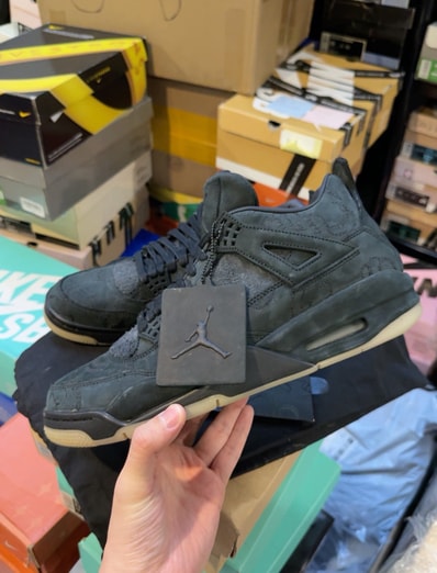 KAWS × Nike Air Jordan 4 Retro "Black"