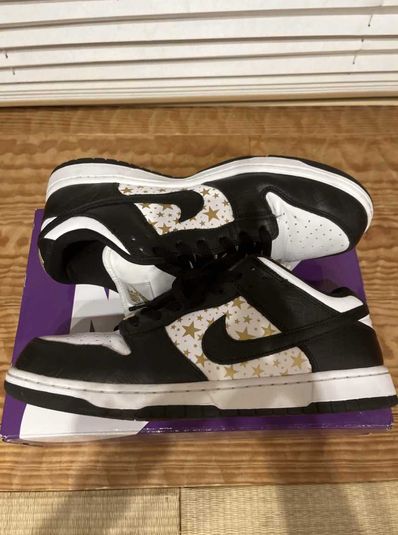 Supreme × Nike SB Dunk Low OG QS Gold Stars "White/Black"
