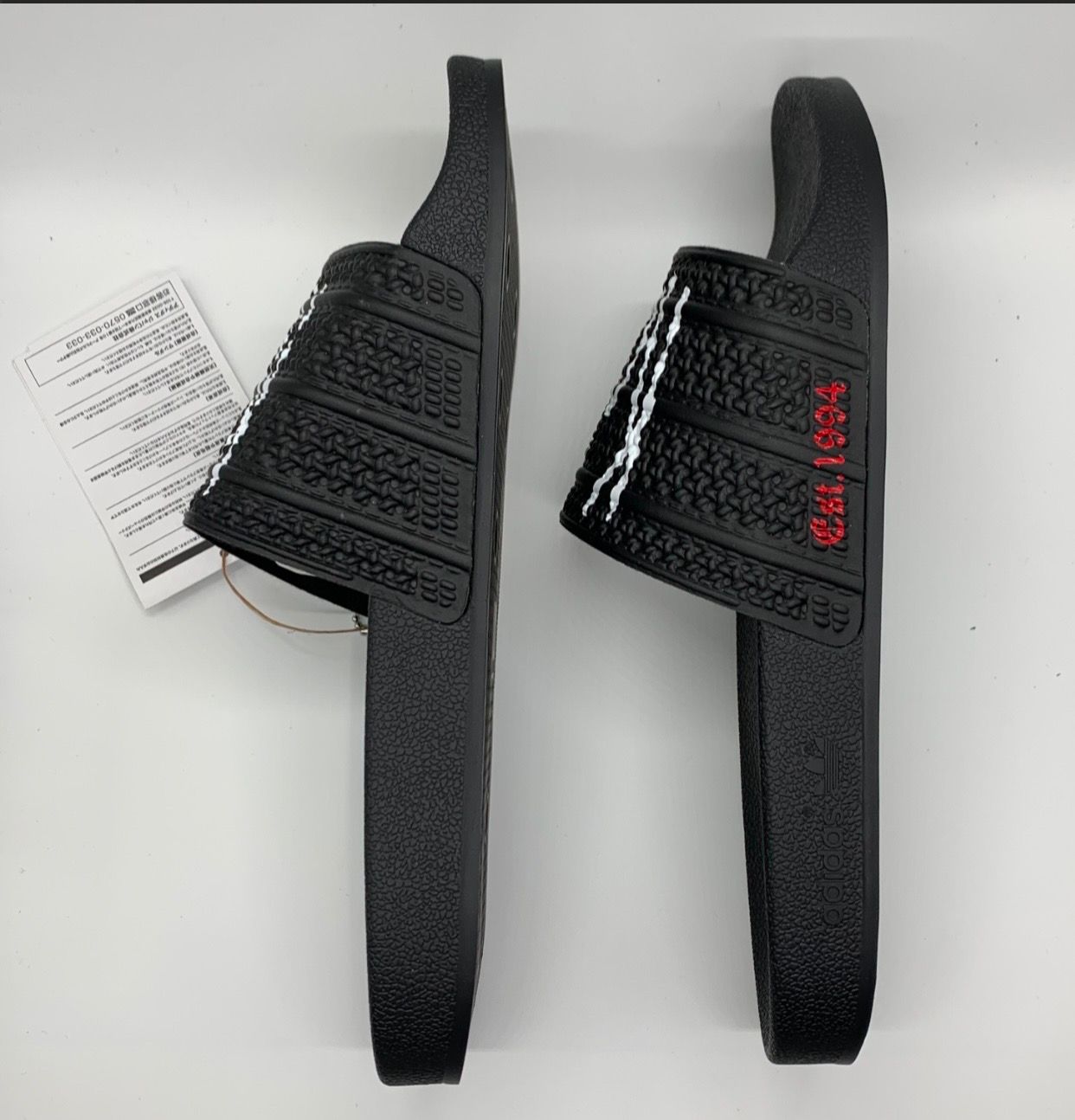 Korn × adidas Adilette "Black/Footwear White/Better Scarlet"