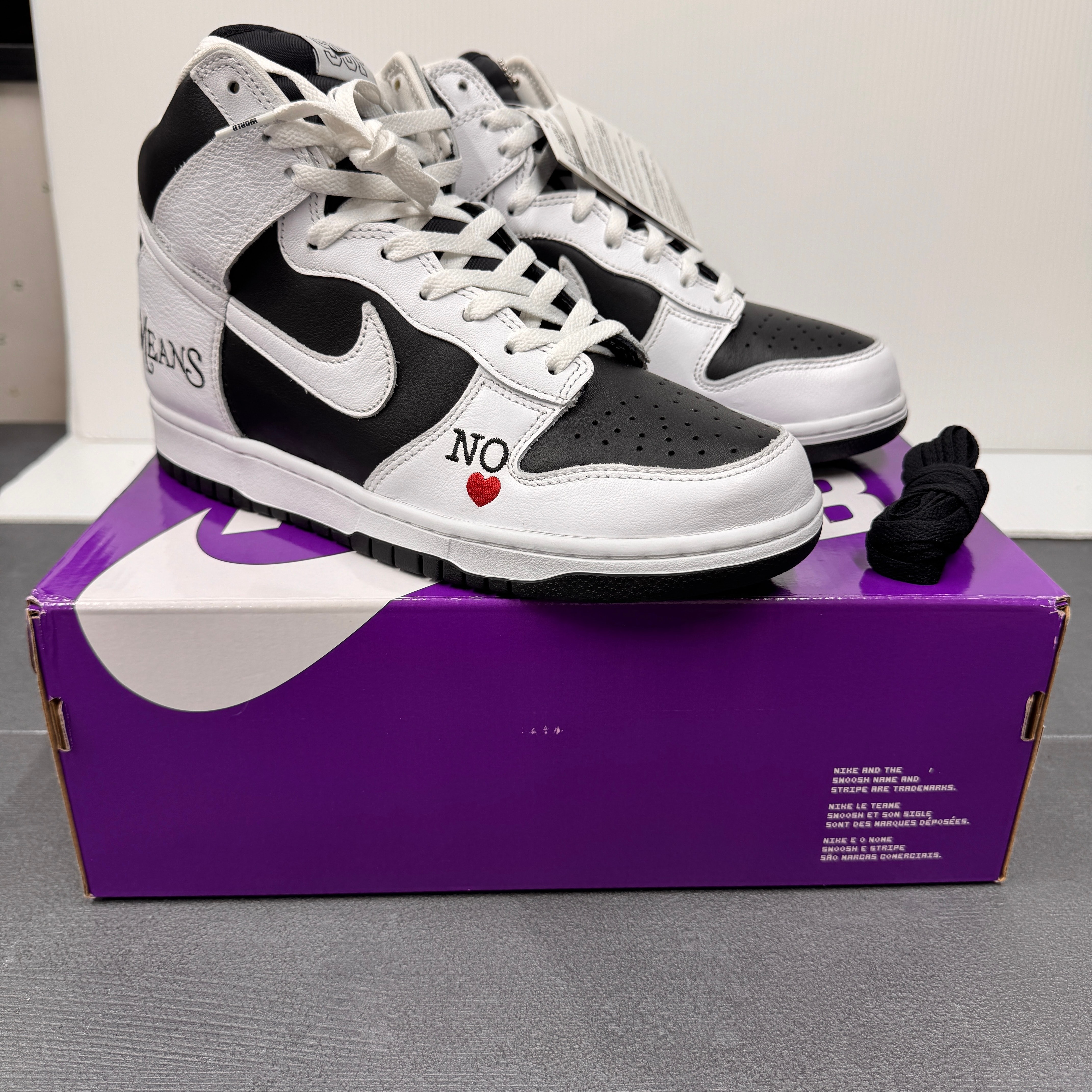 Supreme × Nike SB Dunk High By Any Means "White Black"