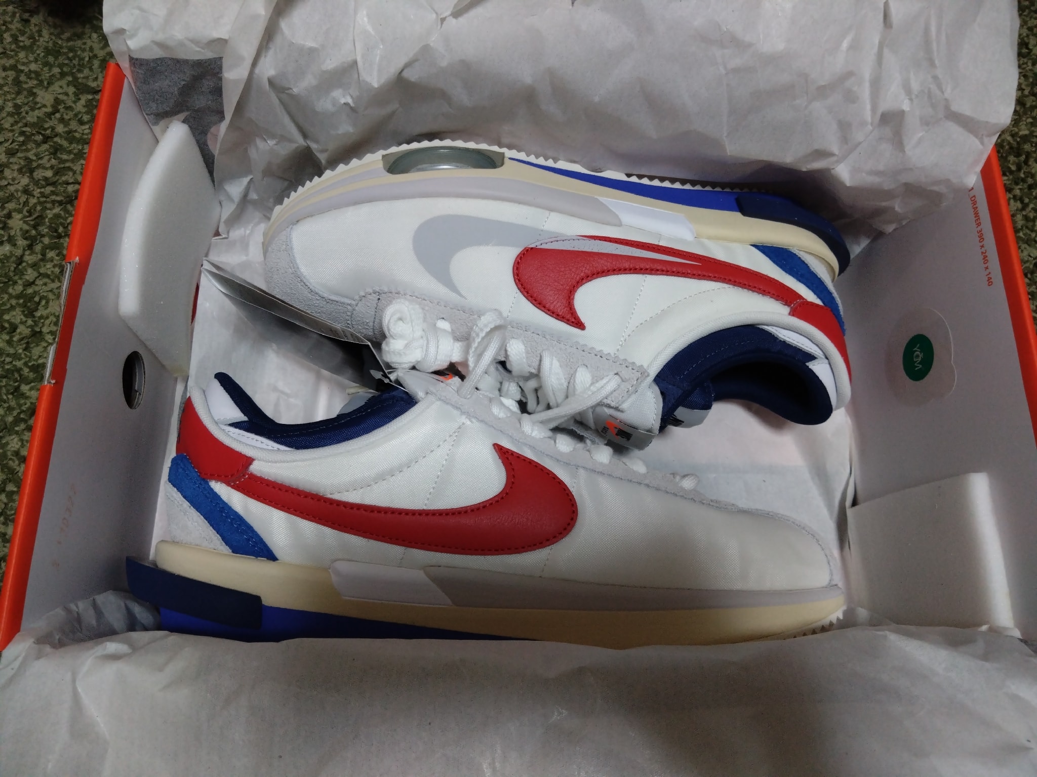 sacai × Nike Zoom Cortez "White and University Red"