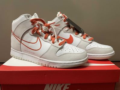 NIKE Women's DUNK HIGH SE FIRST USE "WHITE/ORANGE"