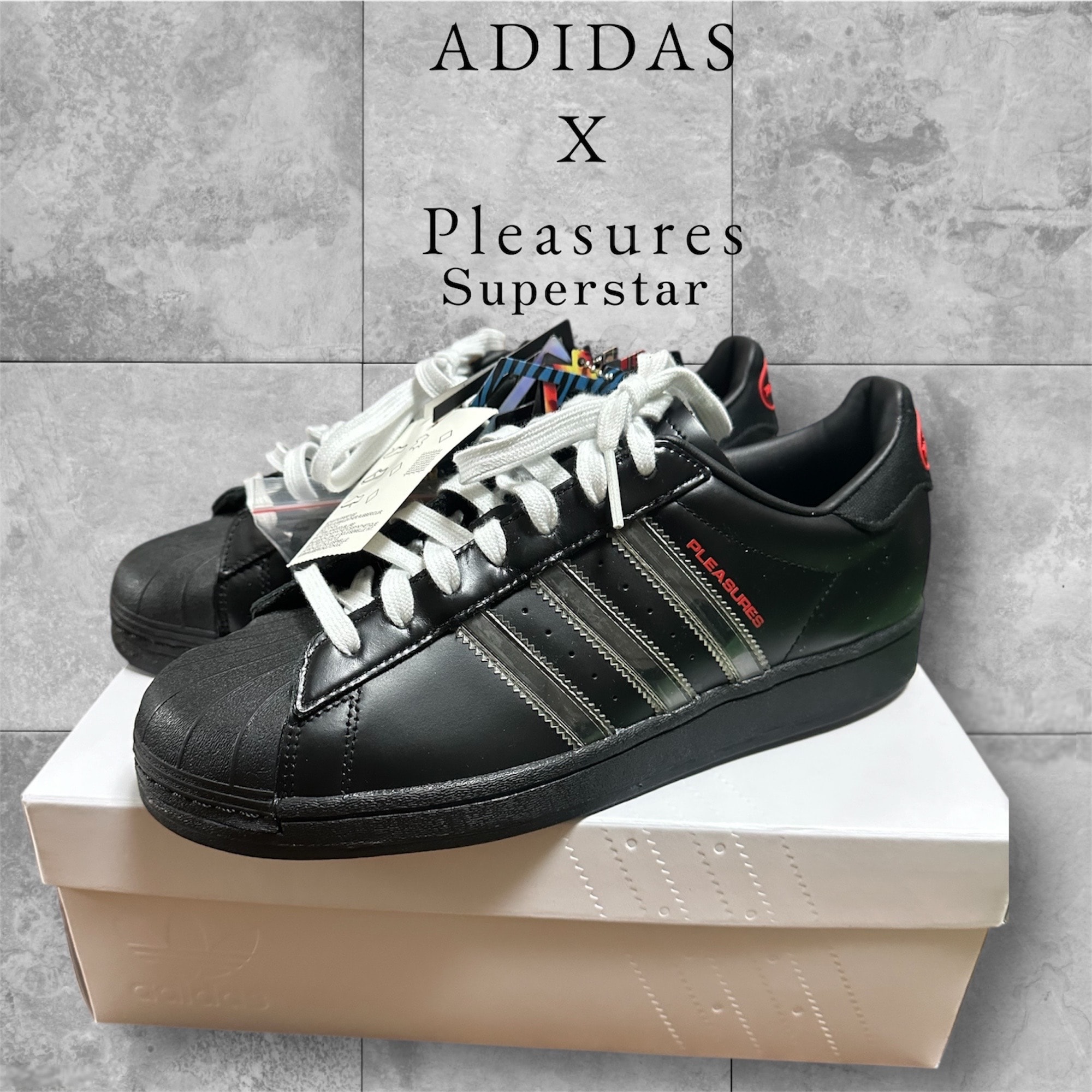 PLEASURES × adidas CONSORTIUM SUPERSTAR "BLACK"