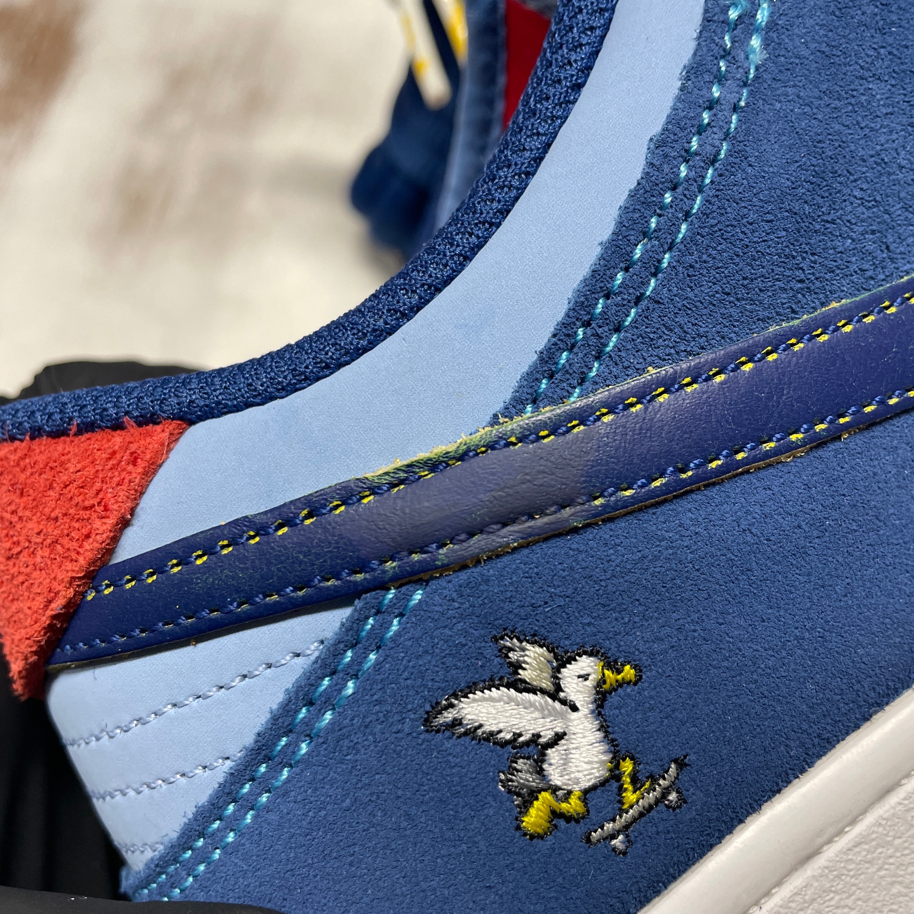 Why So Sad? × Nike SB Dunk Low "Coastal Blue/Speed Yellow-University Red"