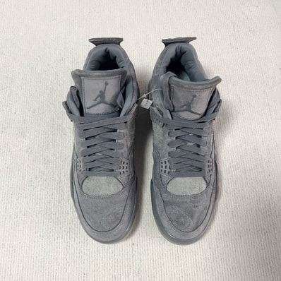 KAWS × Nike Air Jordan 4 Retro "Grey"