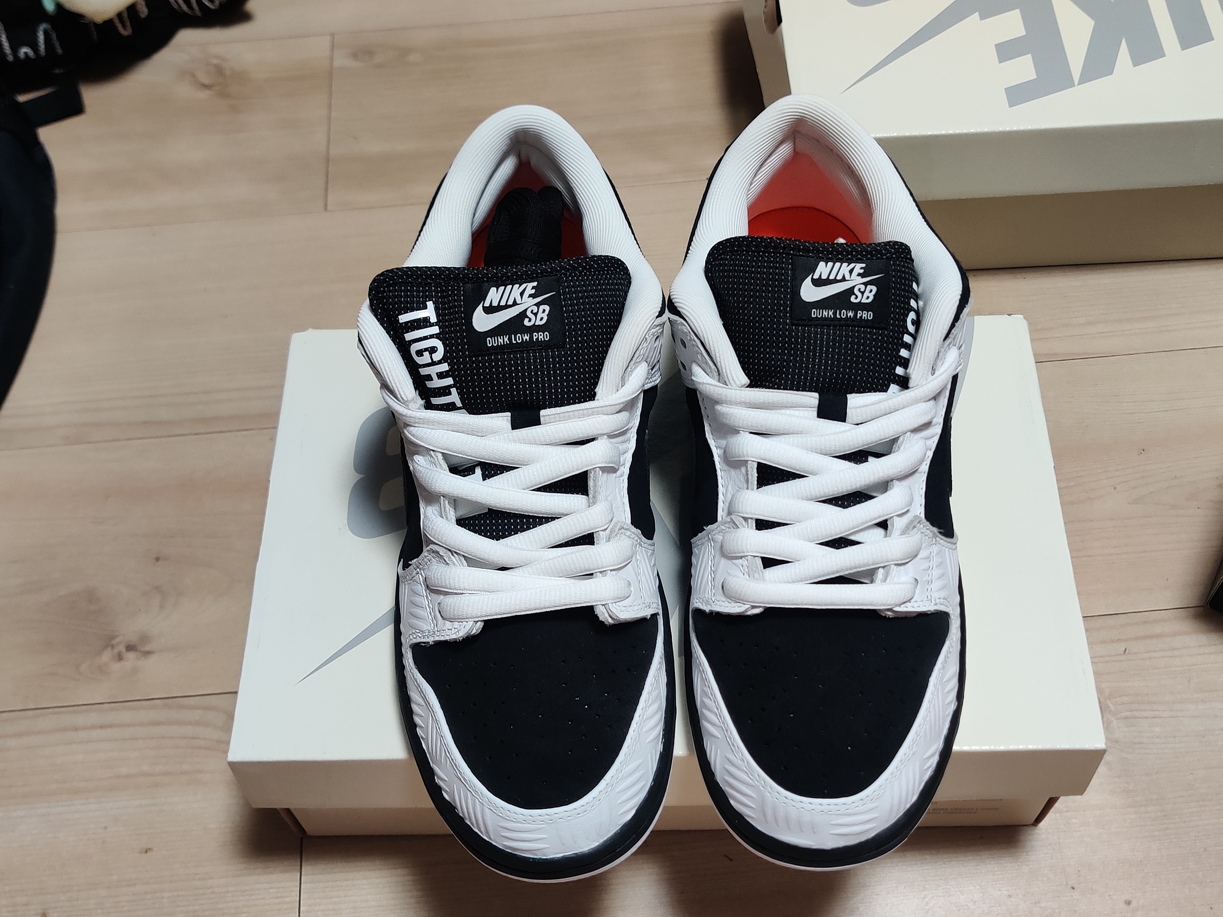 TIGHTBOOTH × Nike SB Dunk Low Pro QS "Black and White"
