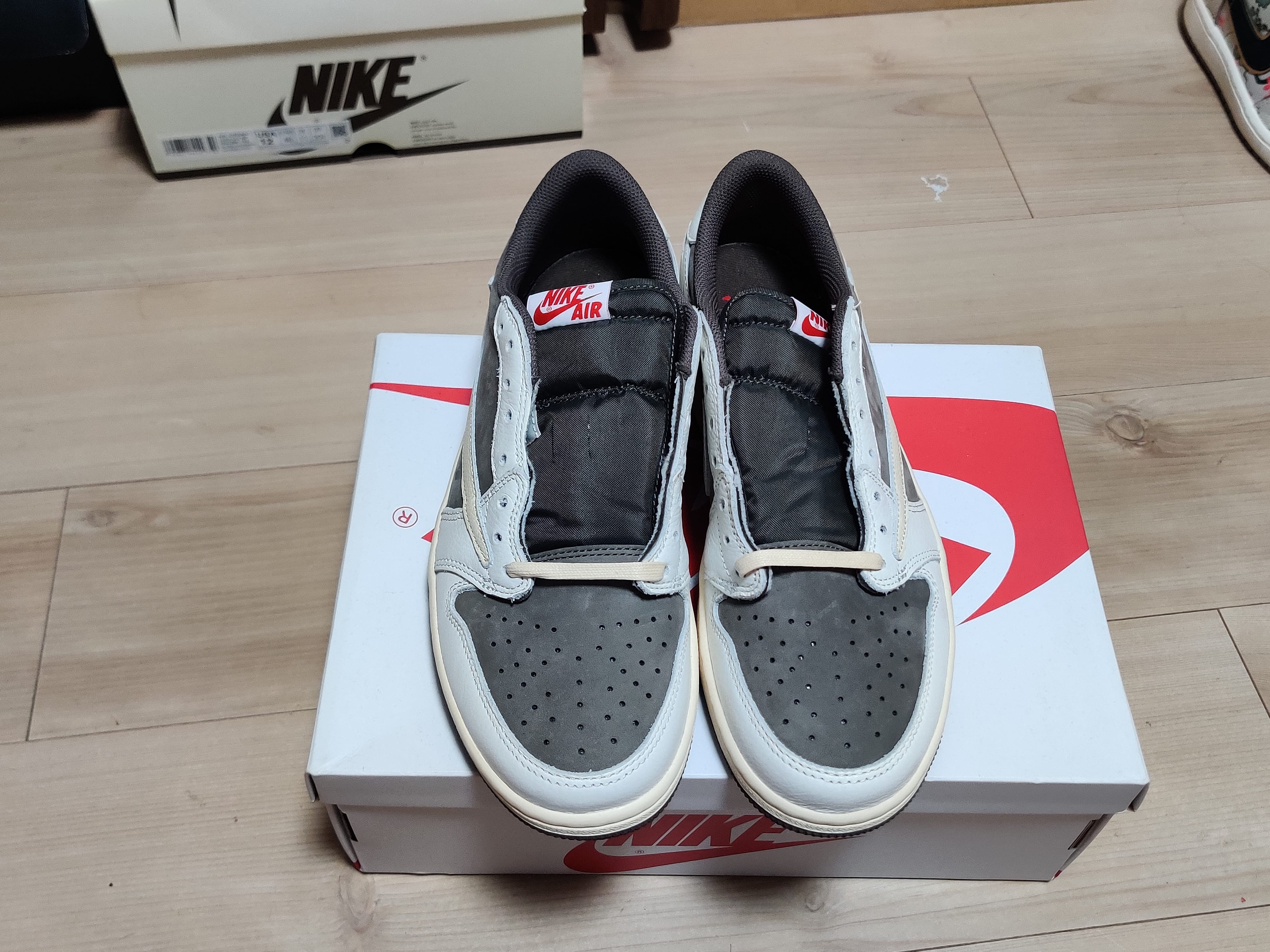 Travis Scott × Nike Air Jordan 1 Low OG SP "Reverse Mocha/Sail and Ridgerock"