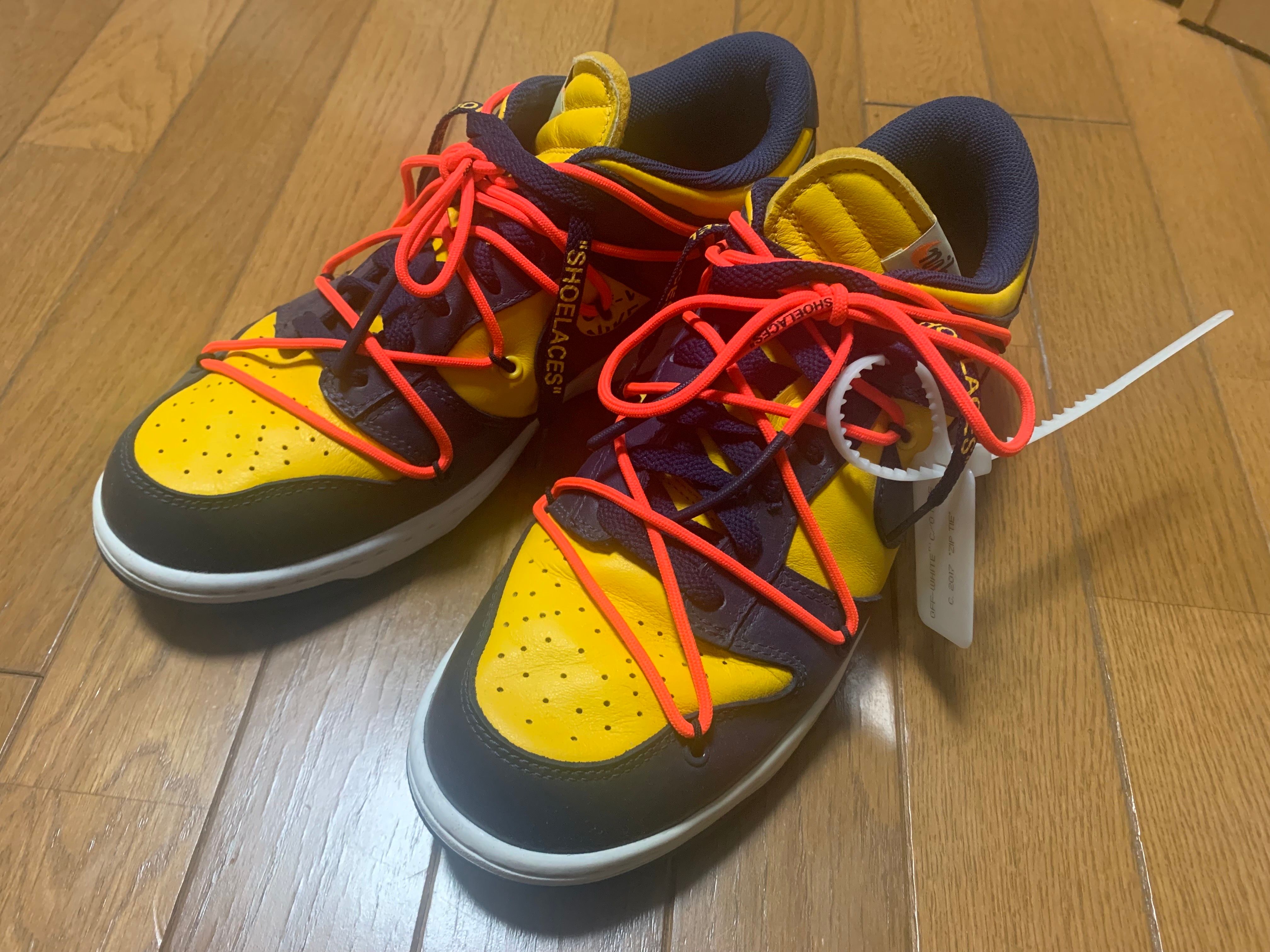 Off-White × Nike Dunk Low LTHR "University Gold/Midnight Navy/White"