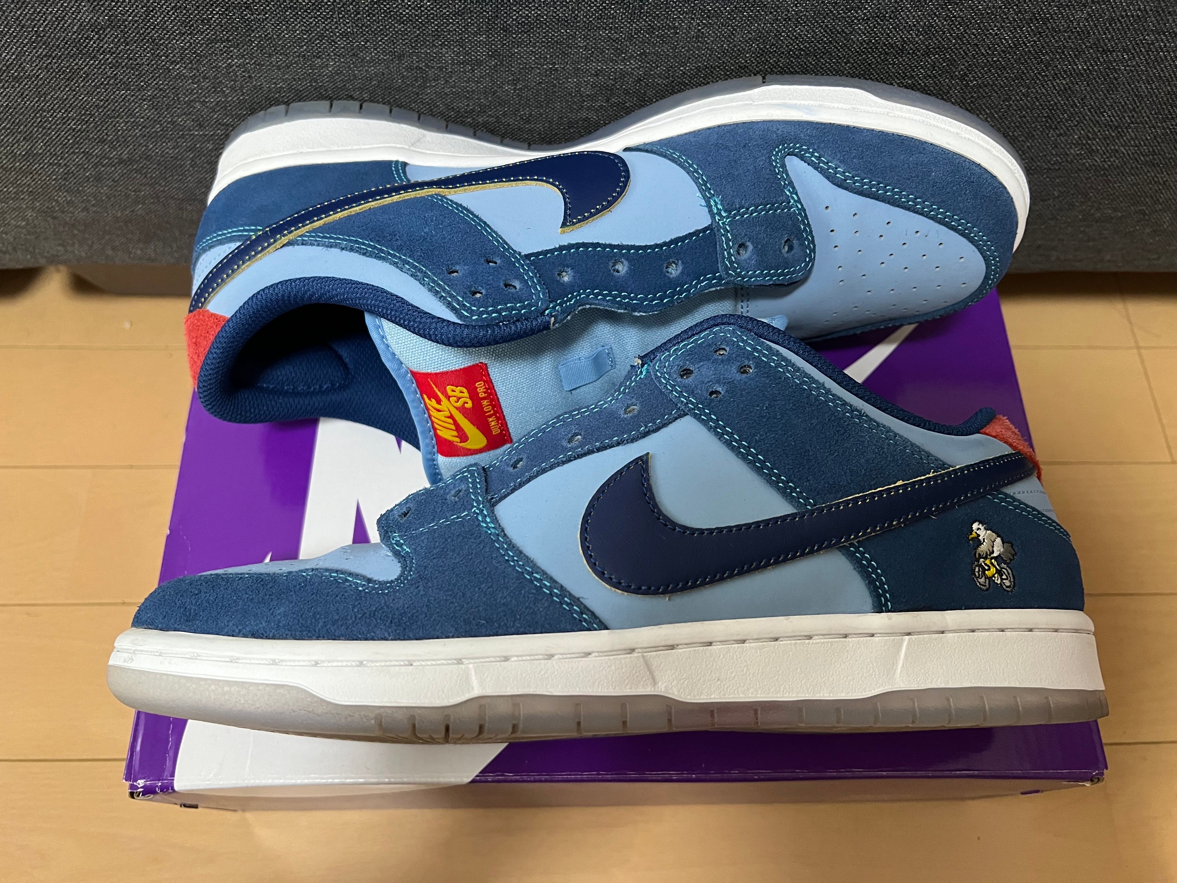 Why So Sad? × Nike SB Dunk Low "Coastal Blue/Speed Yellow-University Red"