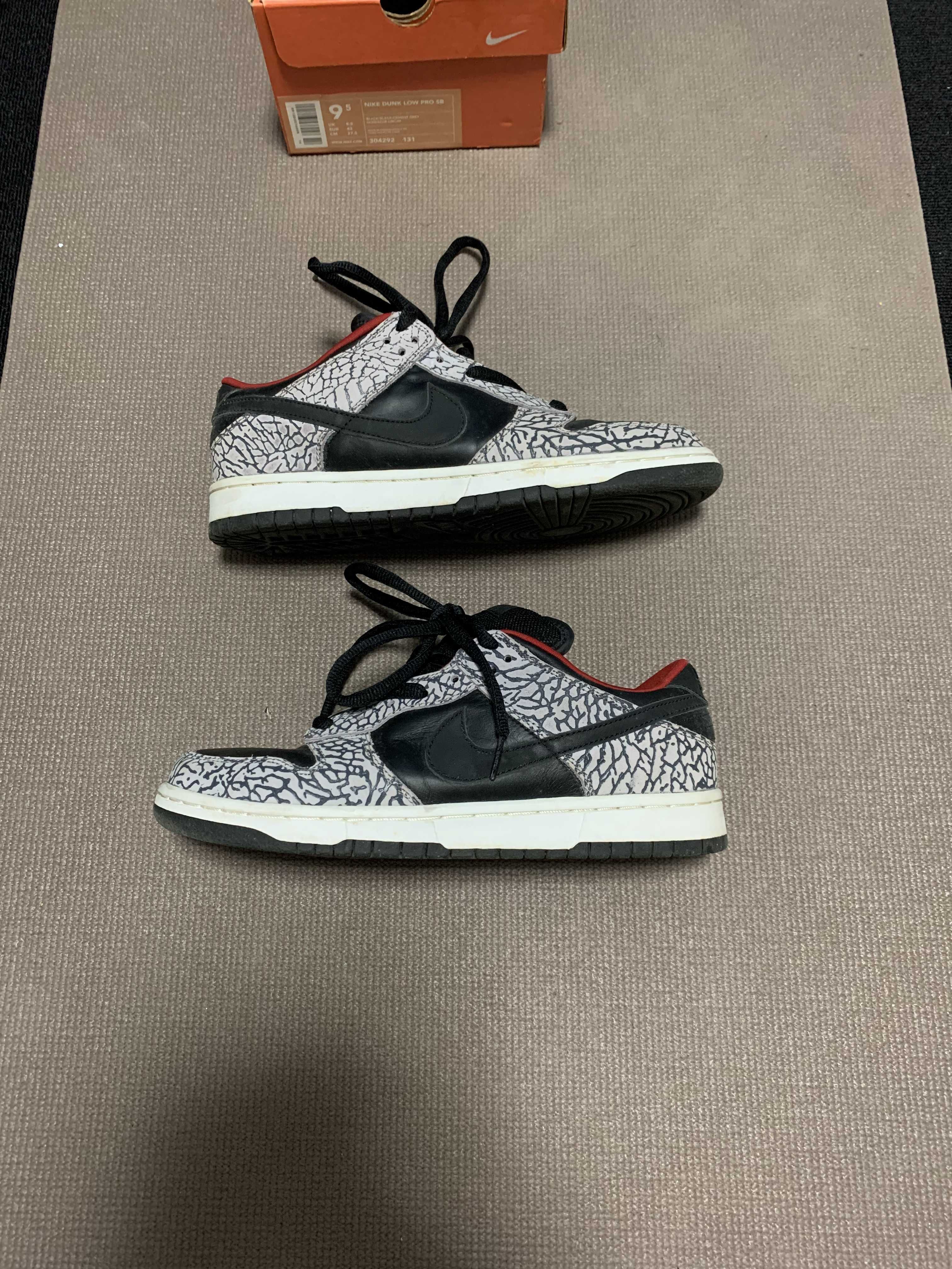 Supreme × Nike SB Dunk Low "White Cement/Safari" (2002)