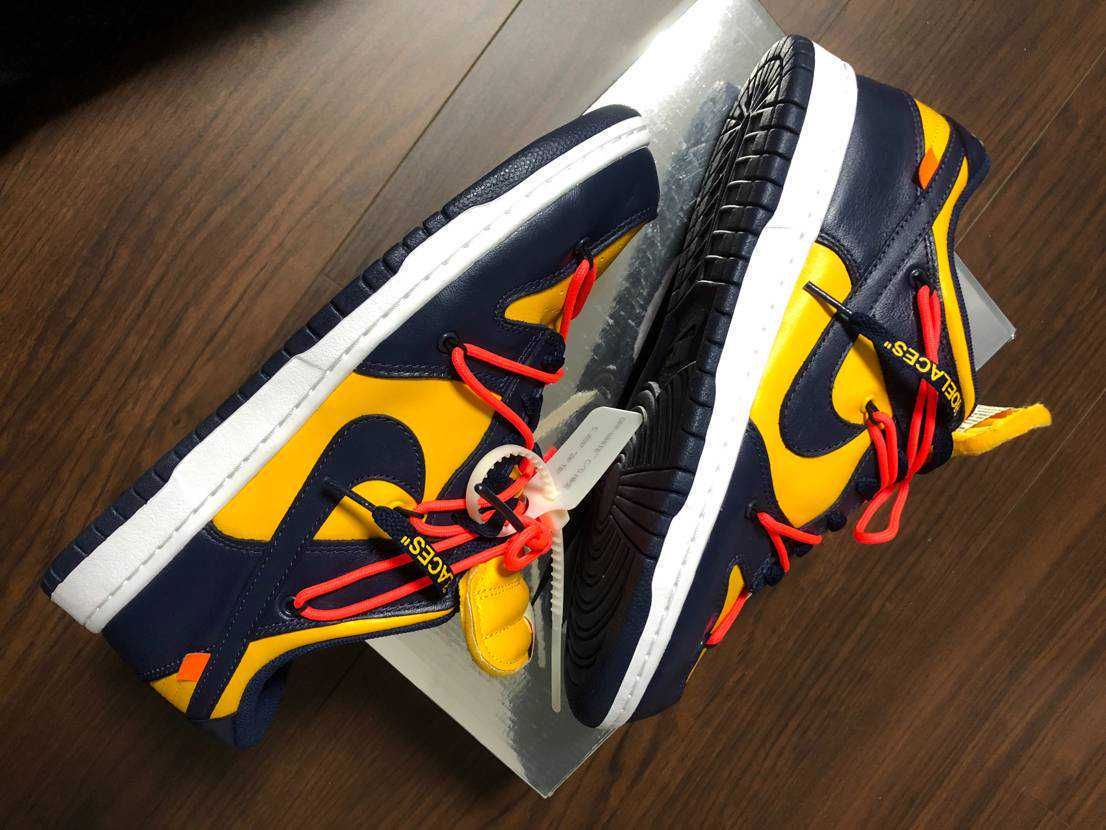 Off-White × Nike Dunk Low LTHR "University Gold/Midnight Navy/White"