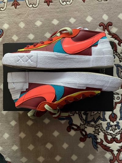 KAWS × sacai × Nike Blazer Low "Team Red"