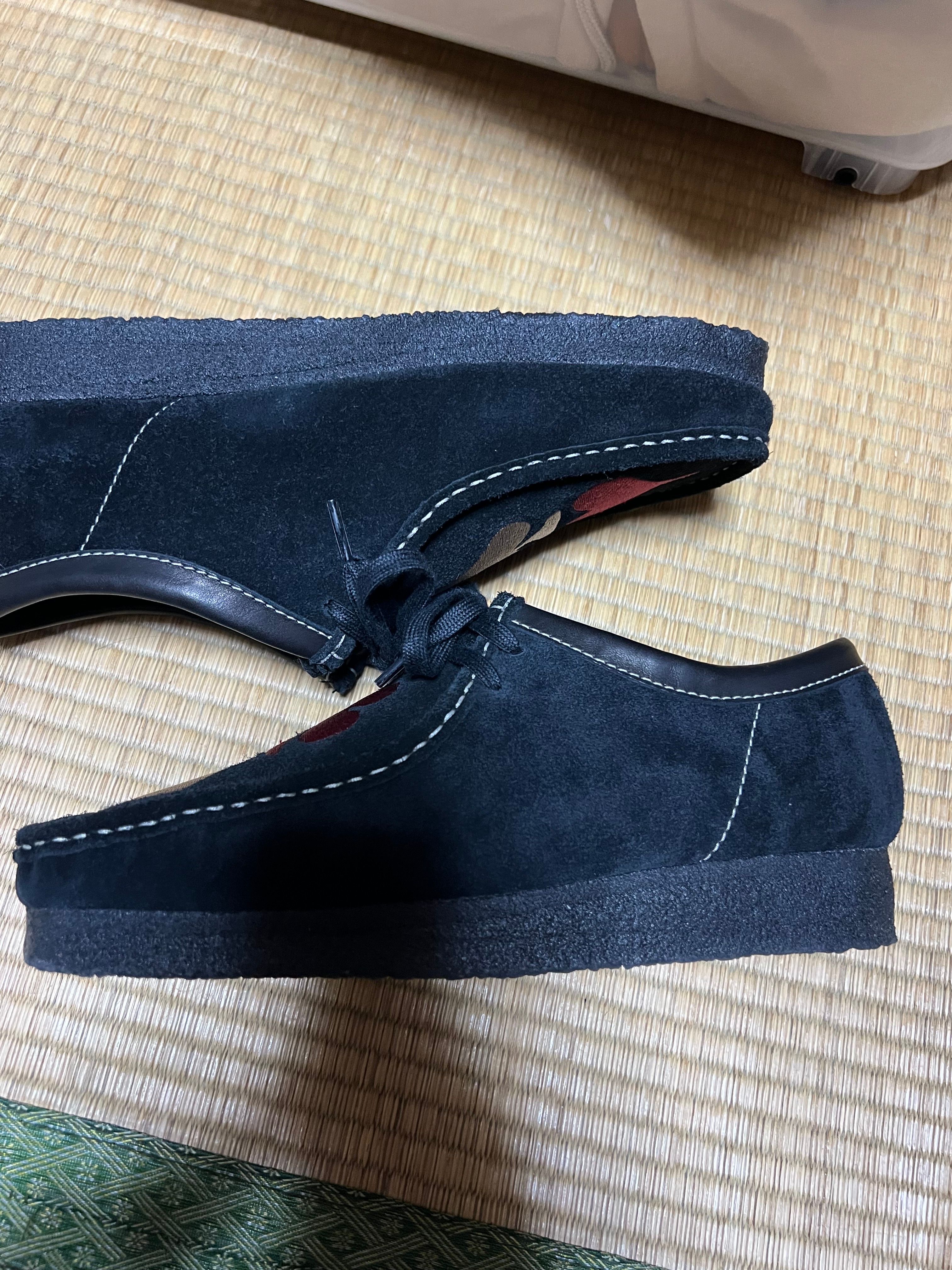 Stussy × Clarks Wallabee "Black Suede/Red/Gold"