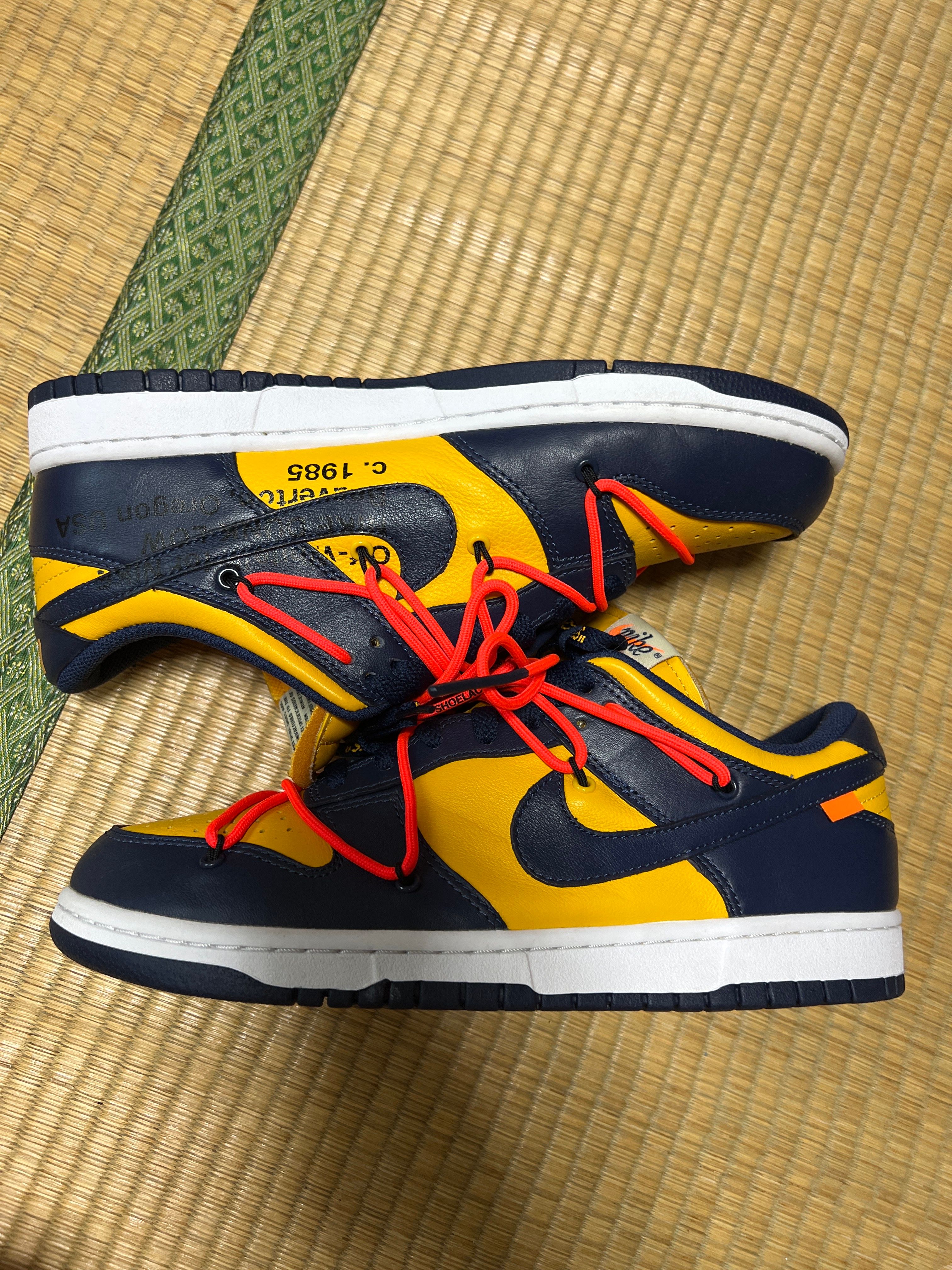 Off-White × Nike Dunk Low LTHR "University Gold/Midnight Navy/White"