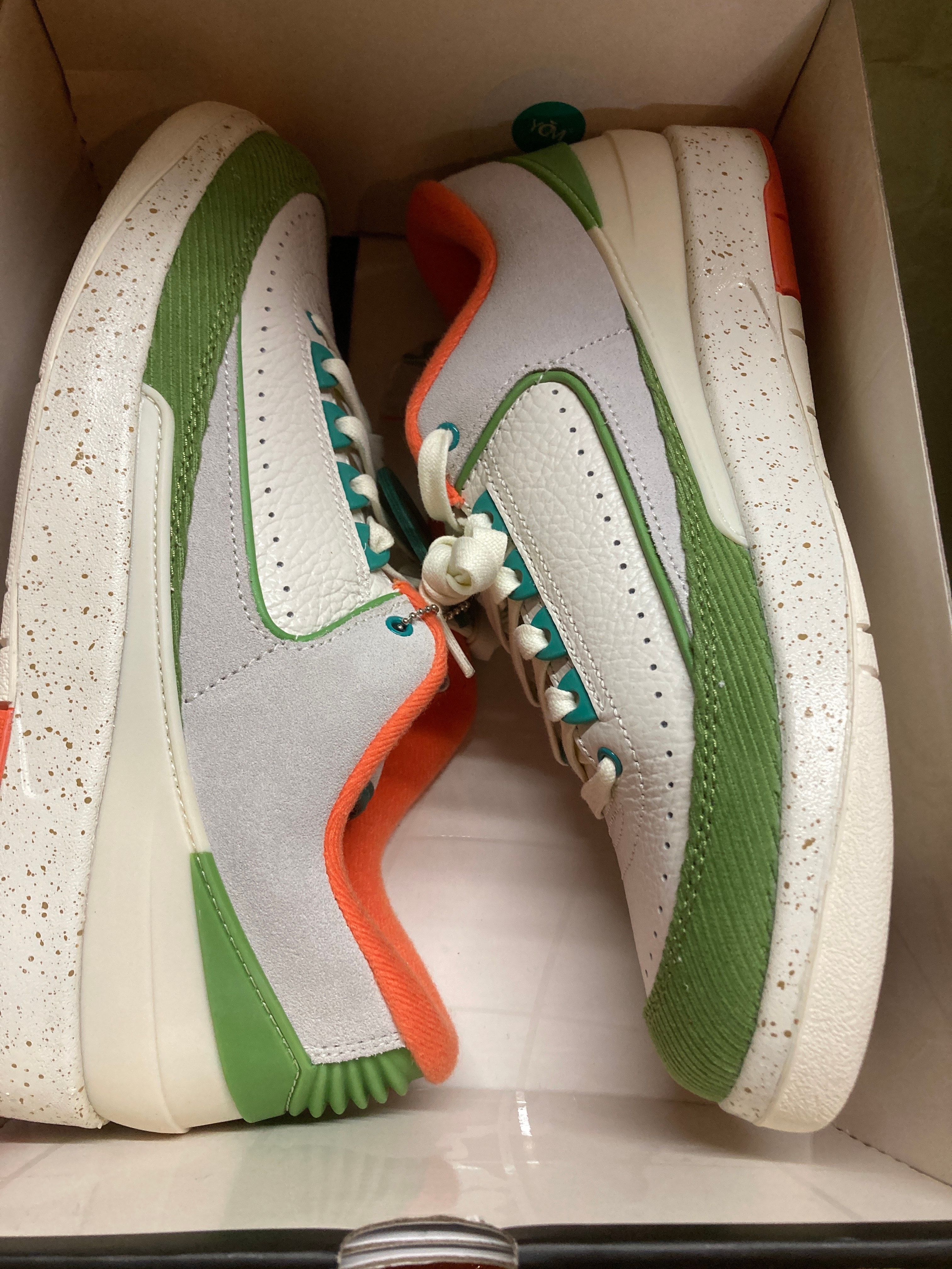 The Titan × Nike Women's Air Jordan 2 Low "Safety Orange/Chlorophyll"