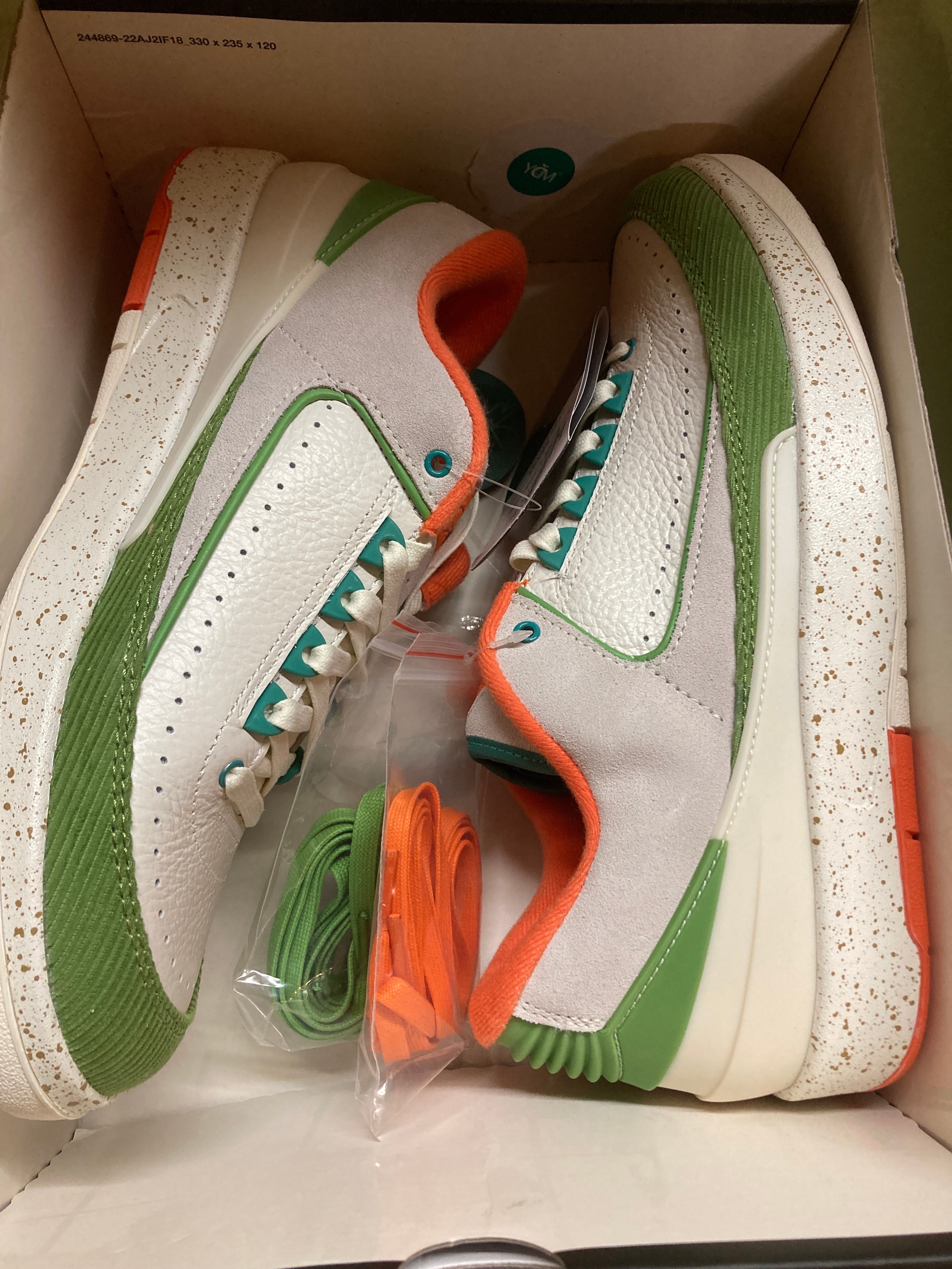 The Titan × Nike Women's Air Jordan 2 Low "Safety Orange/Chlorophyll"