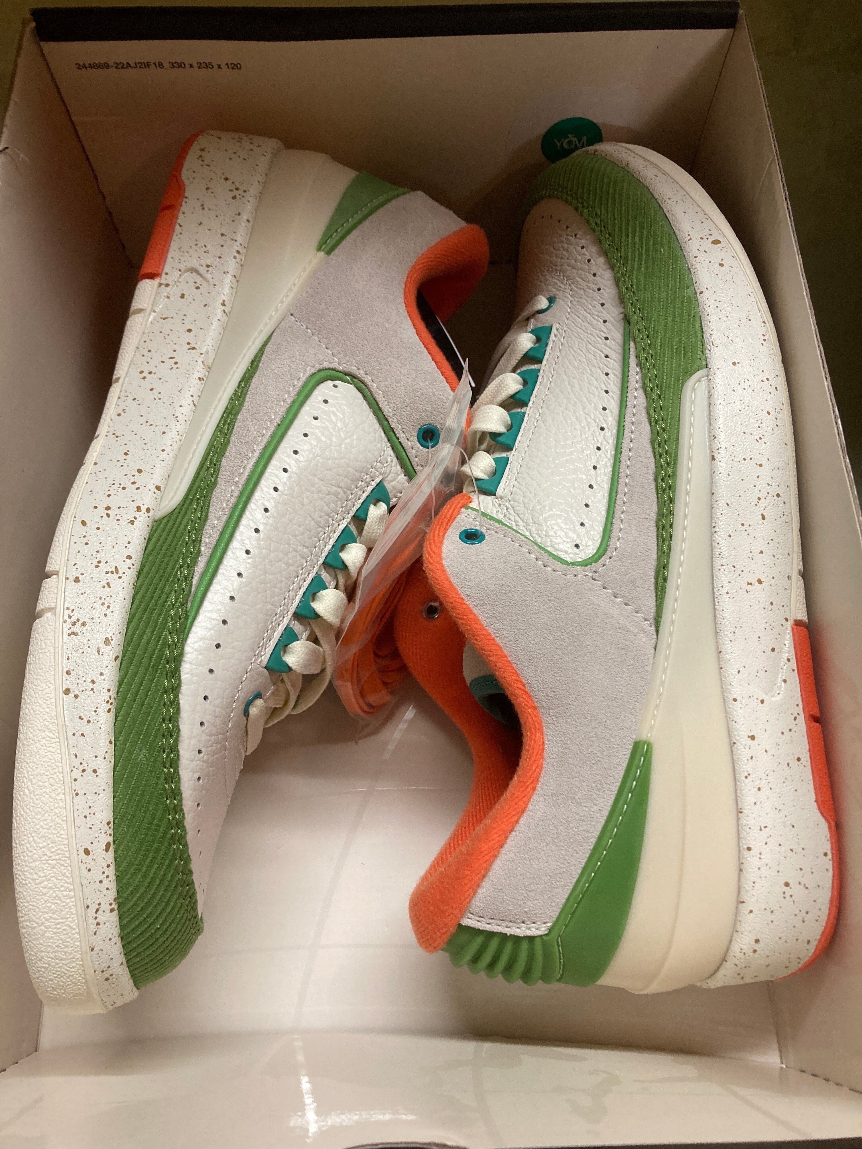 The Titan × Nike Women's Air Jordan 2 Low "Safety Orange/Chlorophyll"