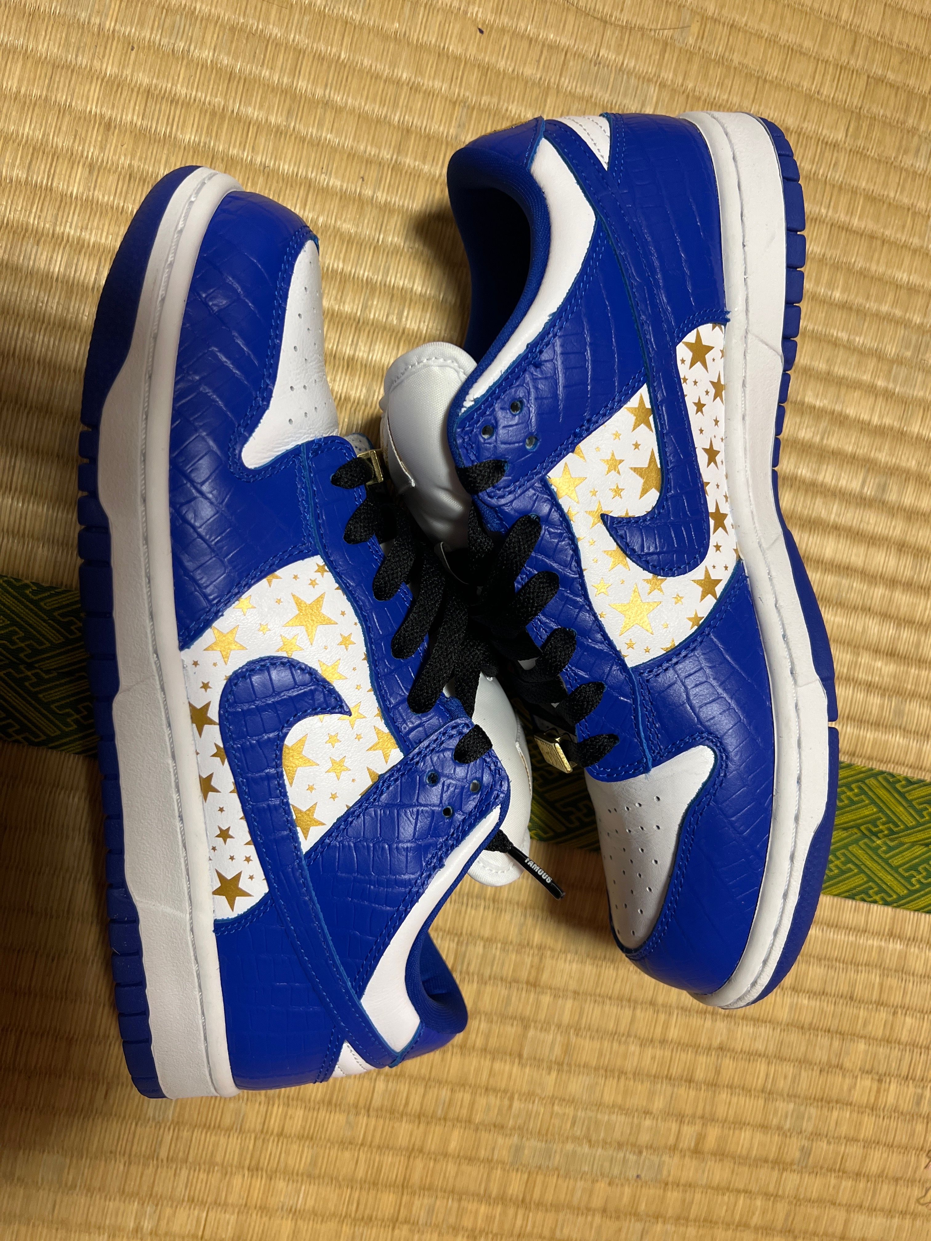 Supreme × Nike SB Dunk Low OG QS Gold Stars "White/Hyper Blue"