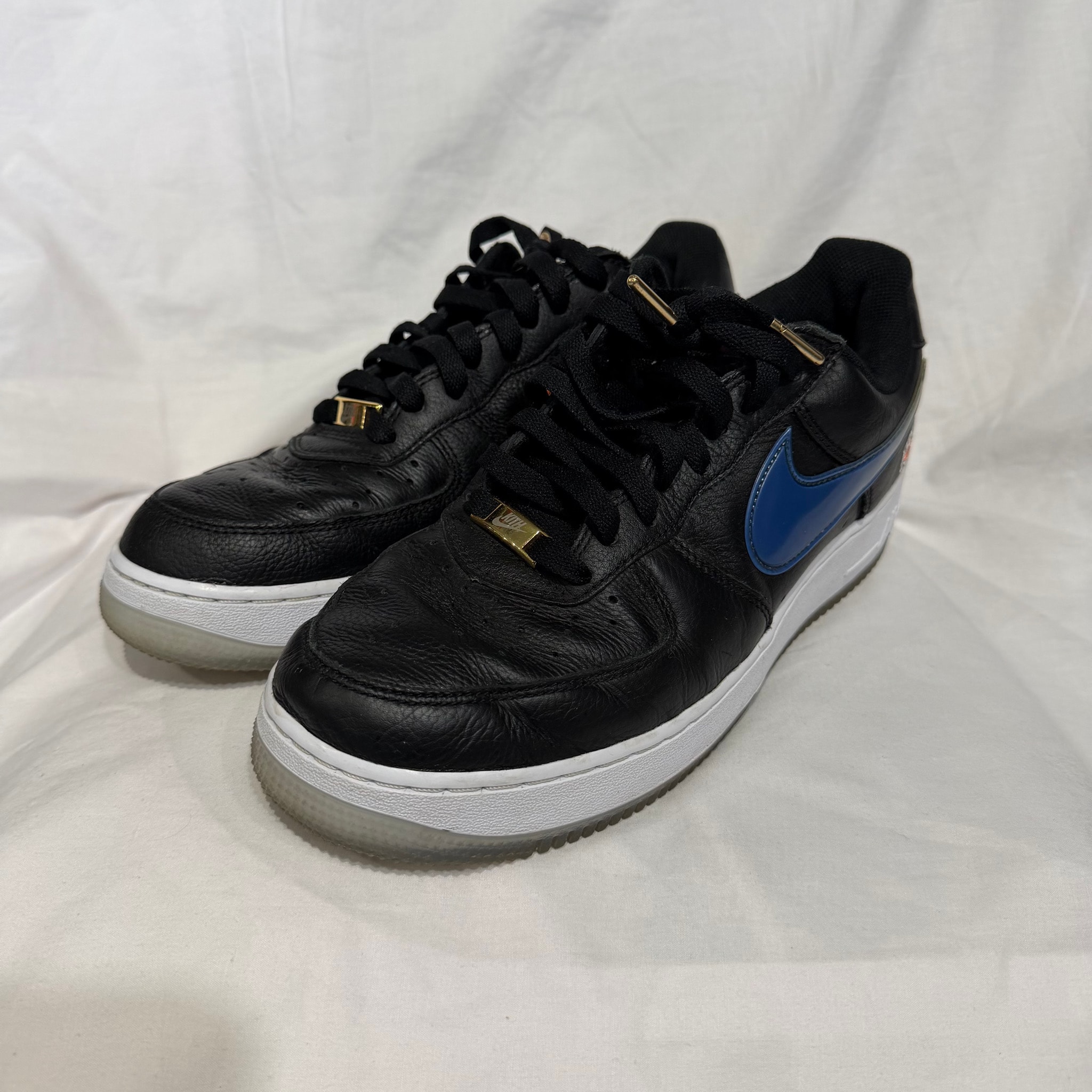 KITH × Nike Air Force 1 Low New York Knicks "Black/Brilliant Orange/Rush/Brilliant White"