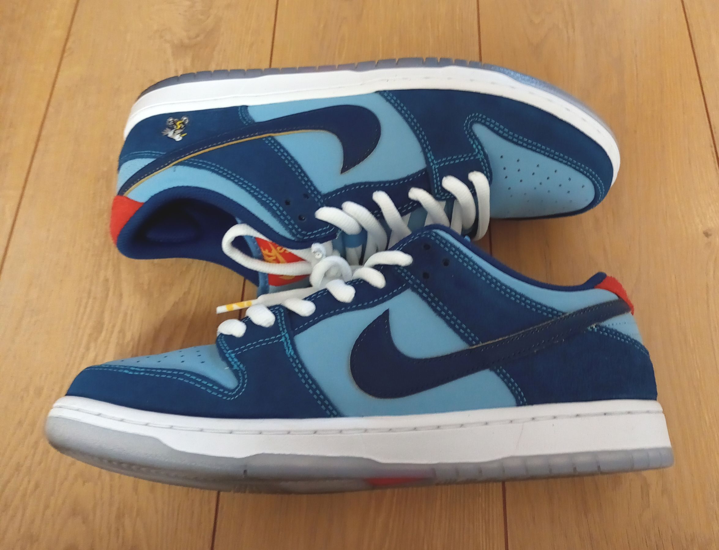 Why So Sad? × Nike SB Dunk Low "Coastal Blue/Speed Yellow-University Red"