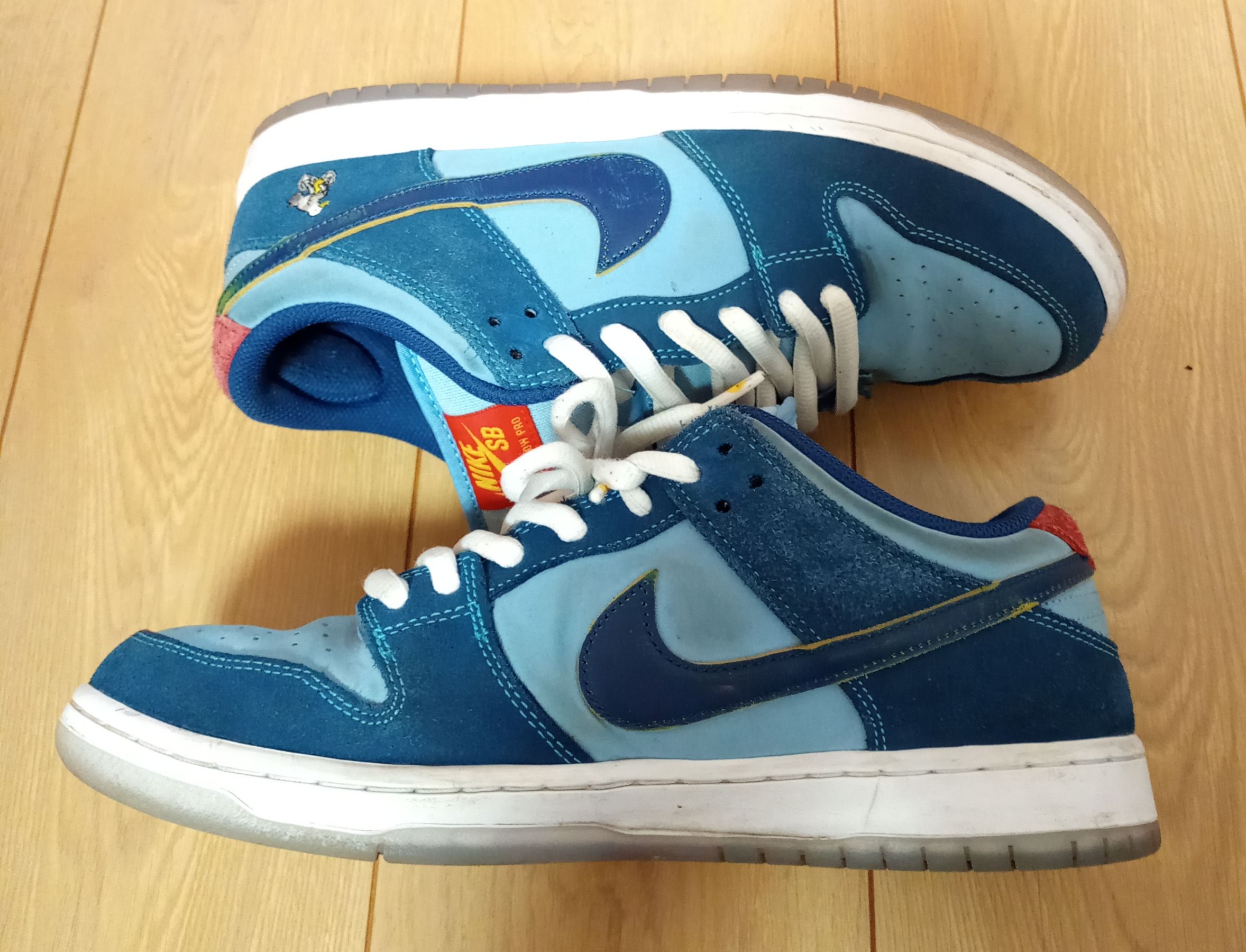 Why So Sad? × Nike SB Dunk Low "Coastal Blue/Speed Yellow-University Red"