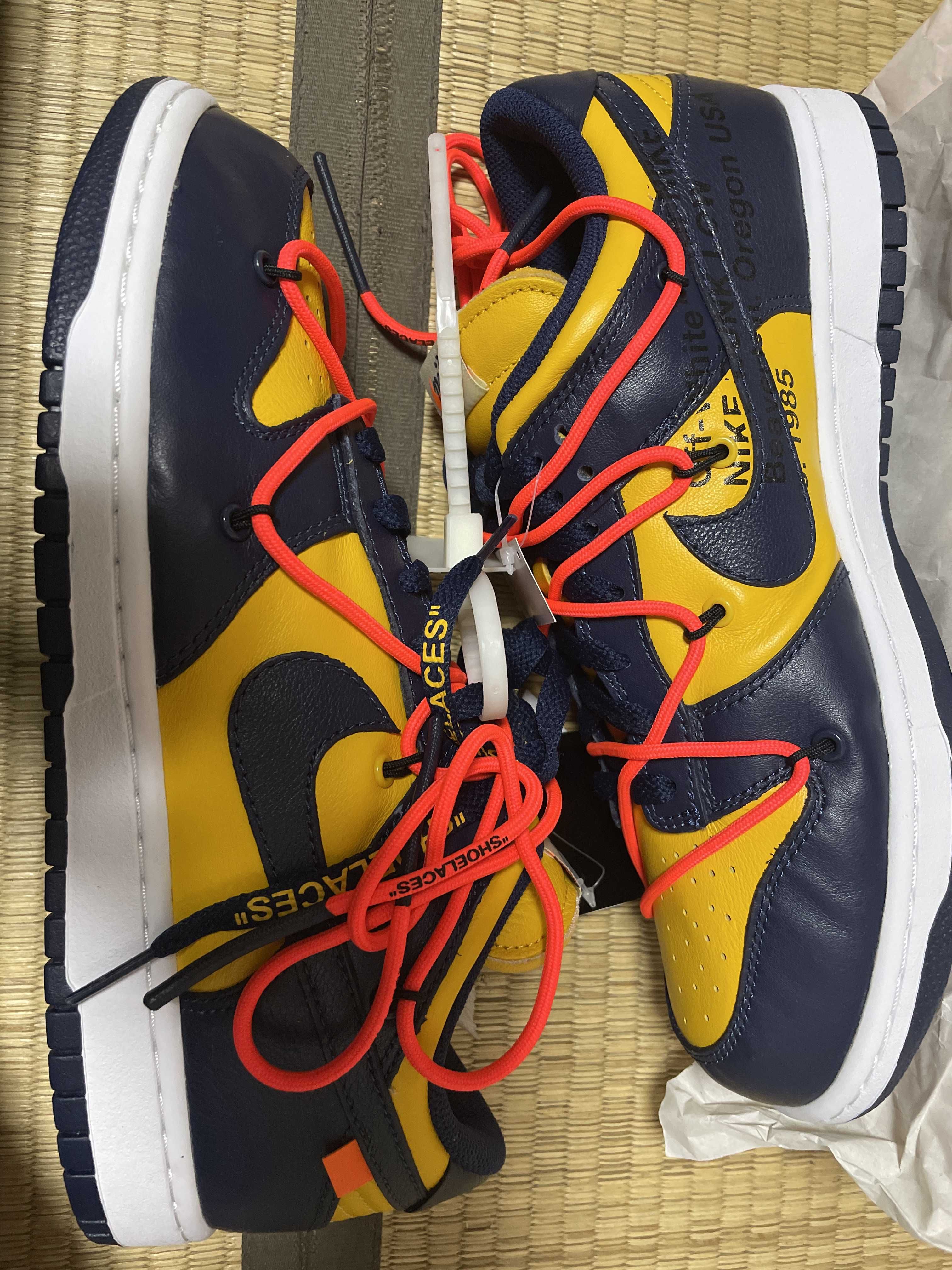 Off-White × Nike Dunk Low LTHR "University Gold/Midnight Navy/White"