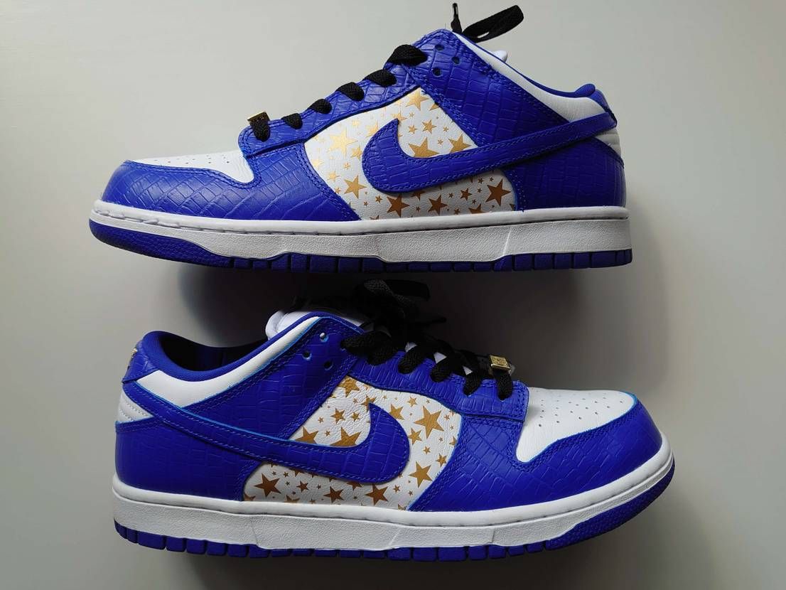 Supreme × Nike SB Dunk Low OG QS Gold Stars "White/Hyper Blue"