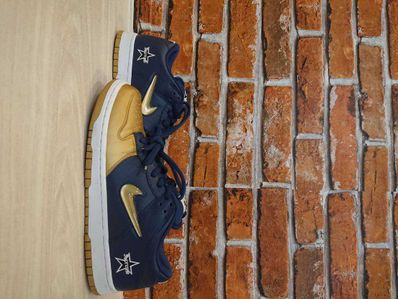 Supreme × Nike SB Dunk Low OG QS "Metallic Gold/Navy"
