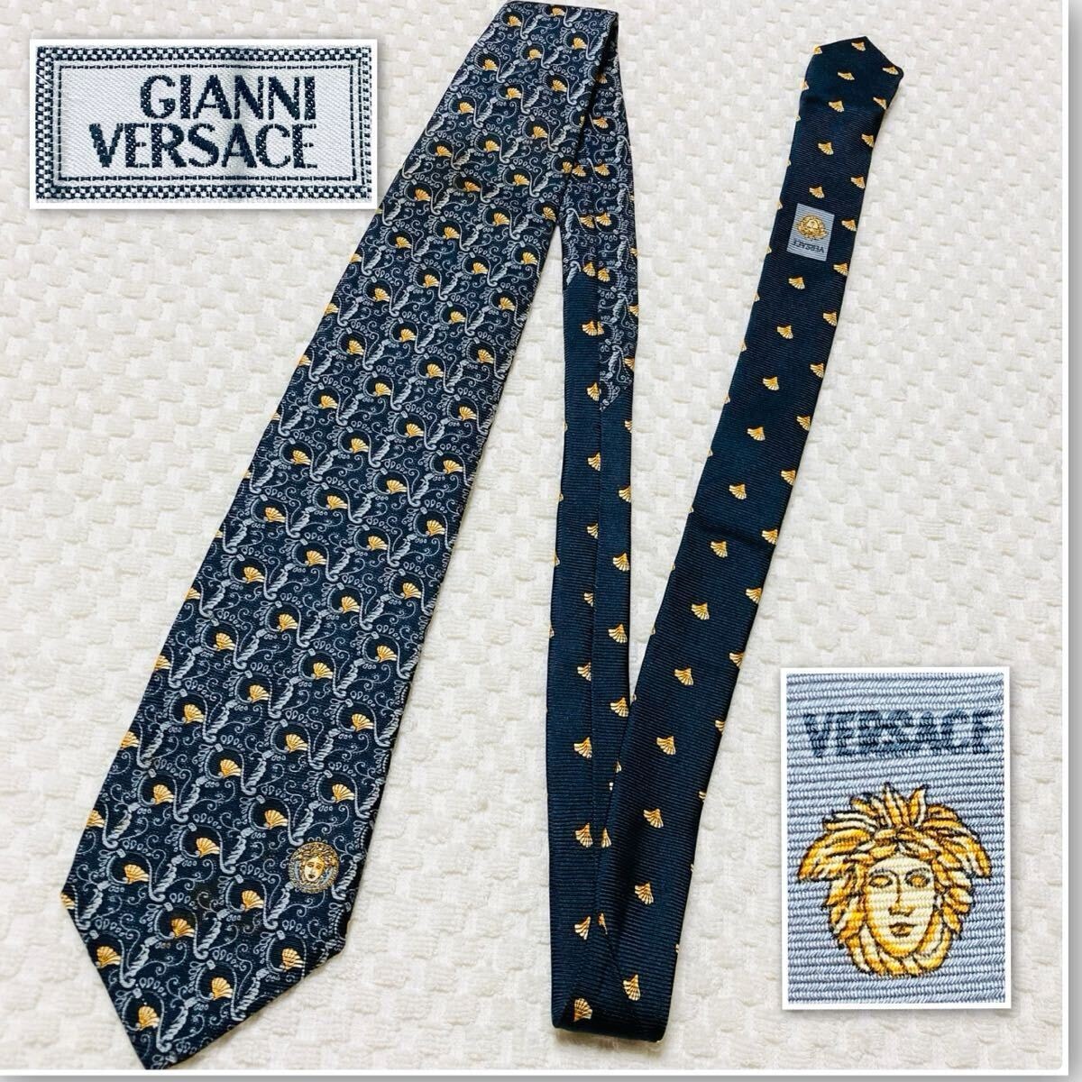 ■極美品■GIANNIVERSACE ジャンニヴェルサーチ　ネクタイ　スカーフ柄　紐とタッセル風装飾　総柄　シルク100% イタリア製　ネイビー