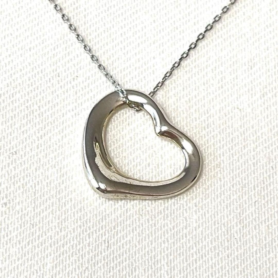PALACE x HIM Tri Gram Pendant 