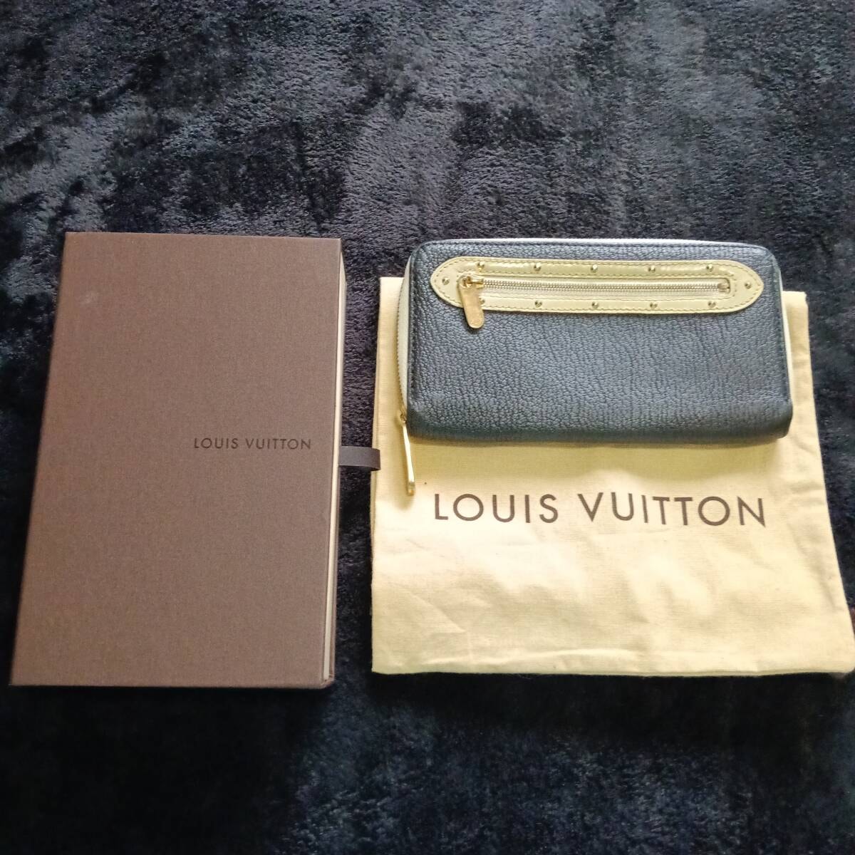 LOUIS VUITTON スハリ ツートンカラー ジッピー M93206