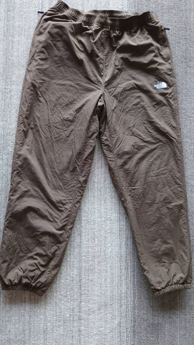 ★未着用 メンズXL THE NORTH FACE ザ・ノース・フェイス　バーサタイルノマドパンツ NB82530 裏地フリース 防寒 撥水 色：ブラウン