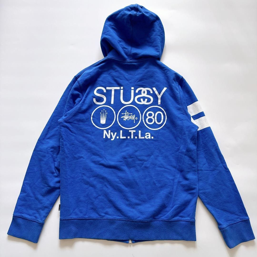 STUSSY ステューシー ショーンフォントロゴ SSロゴ シャネルロゴ Ny.L.T.La クラウン 80 ジップアップパーカー フード L パイル ブルー 青