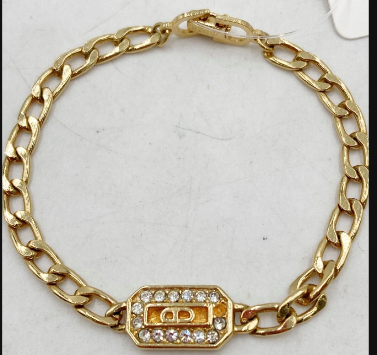 Christian Dior クリスチャンディオール ロゴブレスレット おしゃれ ラインストーン ゴールドカラー アイテム ストーン落ちあり