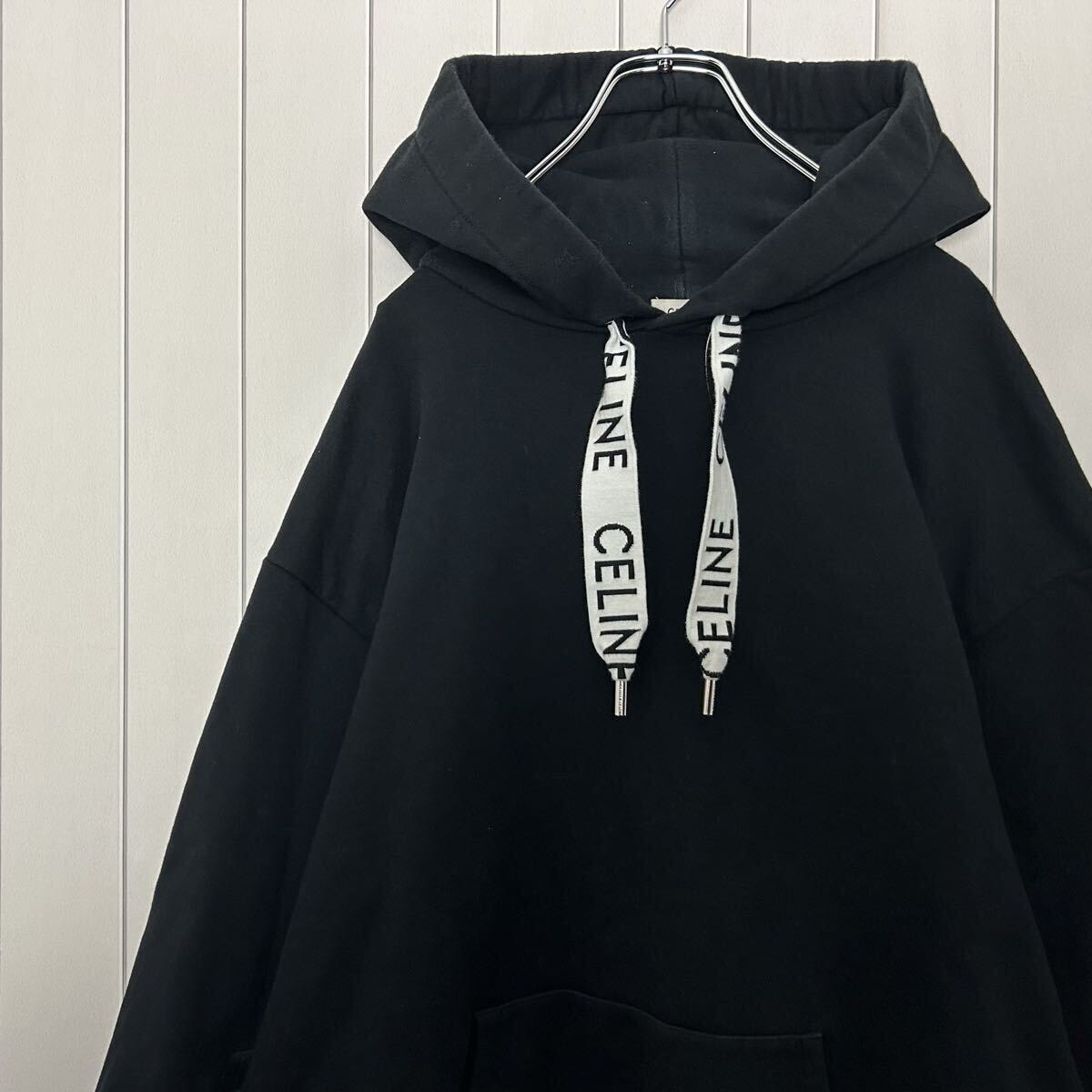 即完売モデル CELINE セリーヌ 21SS ドローコード 紐ロゴ プルパーカー フーディ 長袖 ブラック 黒 トップス メンズ ルーズフーディ