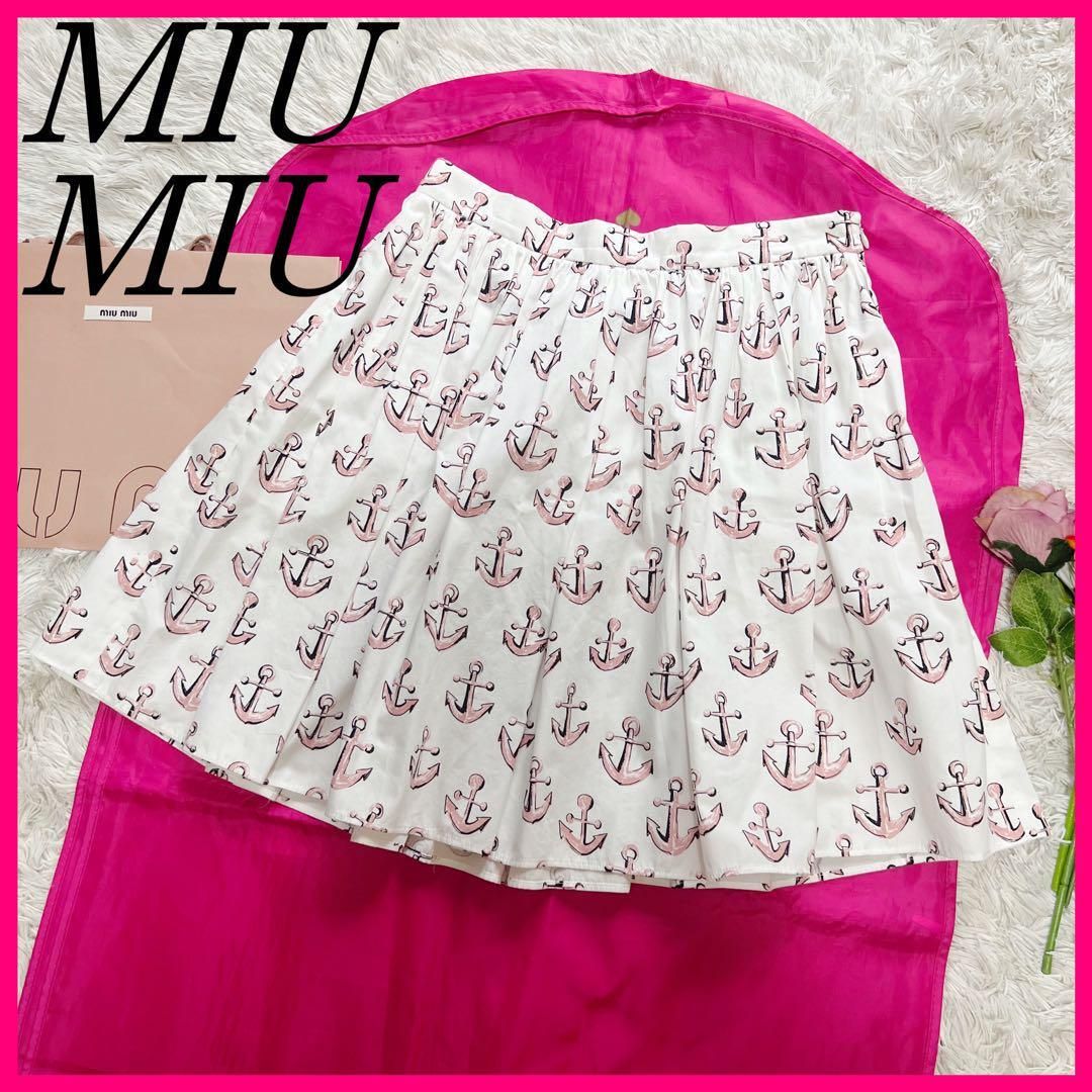 目立った傷や汚れなし】【美品】MIU MIU 膝丈スカート 総柄
