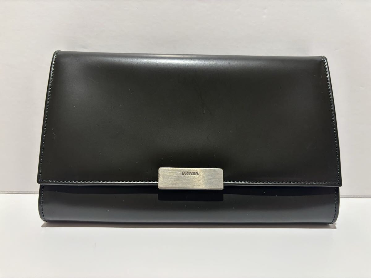 プラダ 長財布 傷なし 目立った傷や汚れなし】PRADA プラダ 長財布 ブラック 黒 美品の古着