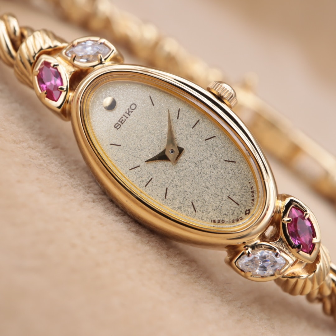 【電池交換/洗浄済】SEIKO 1E20-5760 セイコー オーバル マーキス ストーン 赤石 透明石 ヴィンテージ クォーツ ゴールド レディース CH63
