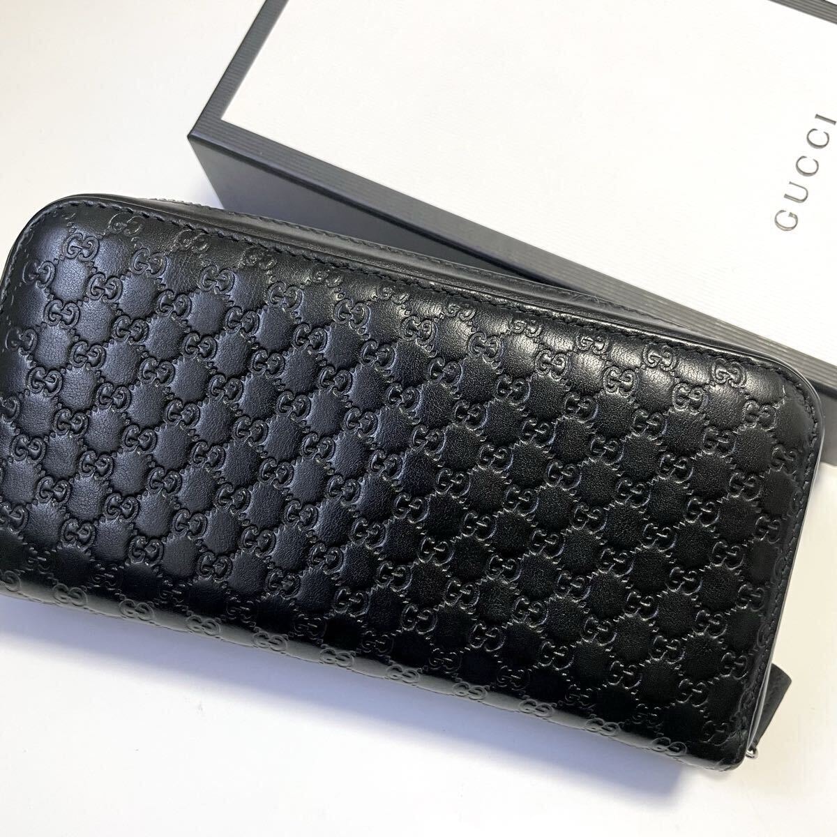 23グッチGUCCI 新品本物 ブラックレザーラウンドファスナー財布