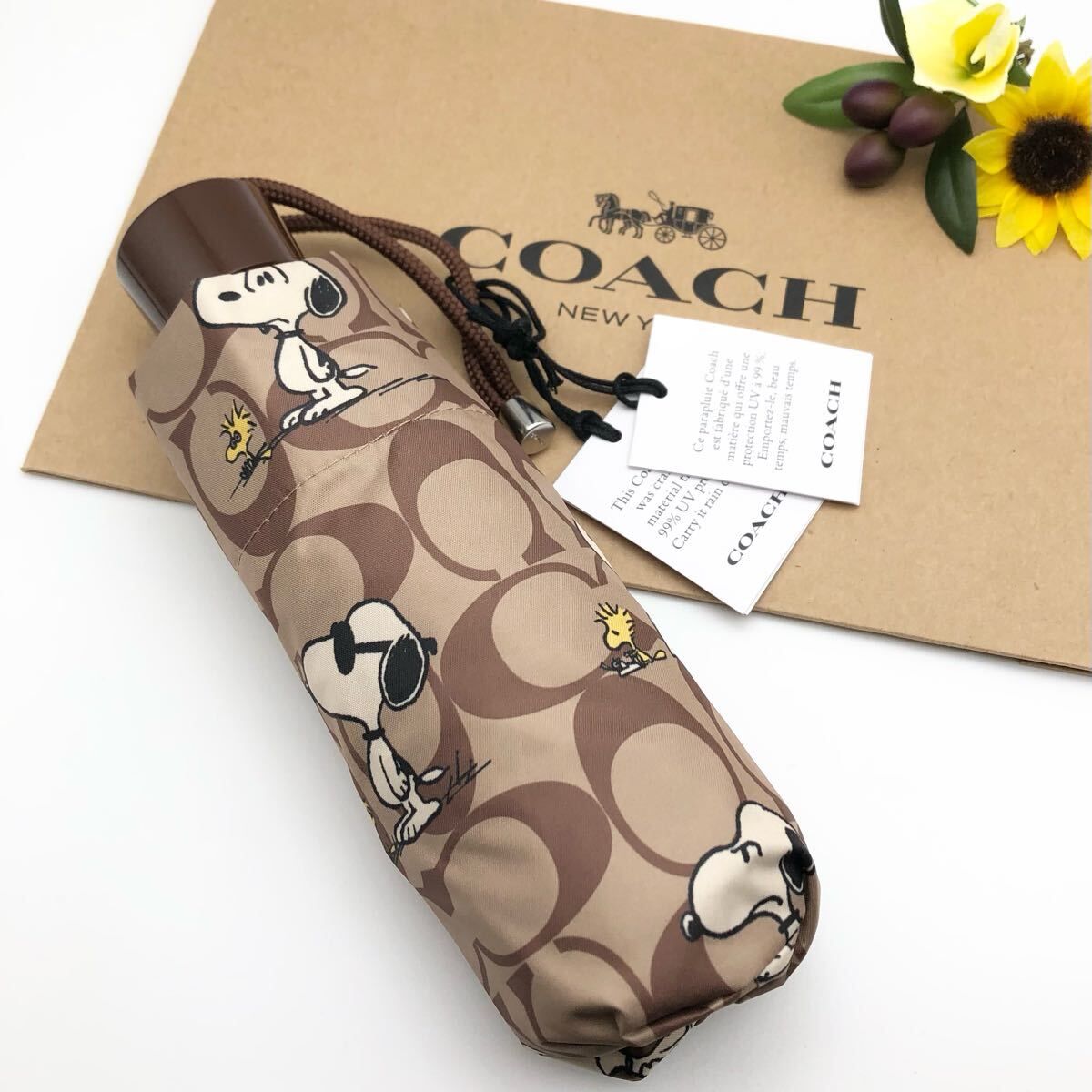 COACH X PEANUTS コラボ ★大人気★ UVプロテクション ミニ アンブレラ シグネチャー スヌーピープリント CBS80 SVY7Z 新品