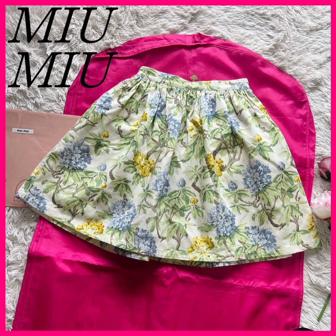 MIU MIU - 【良品】MIU MIU 膝丈スカート フレア ブラック 花柄