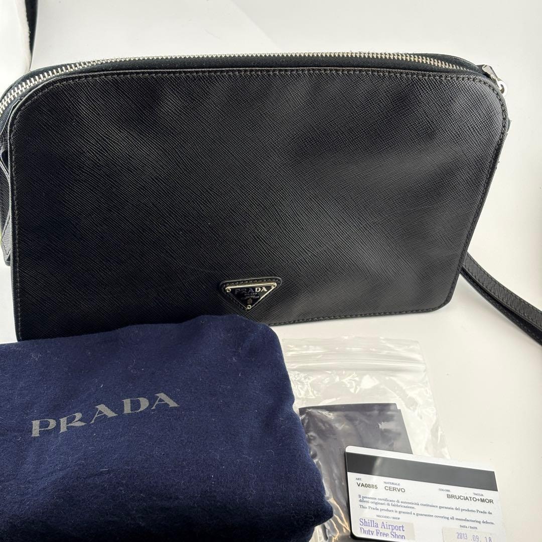 PRADAサフィアーノ黒クラッチバッグ三角ロゴ ギャランティ保存袋付き