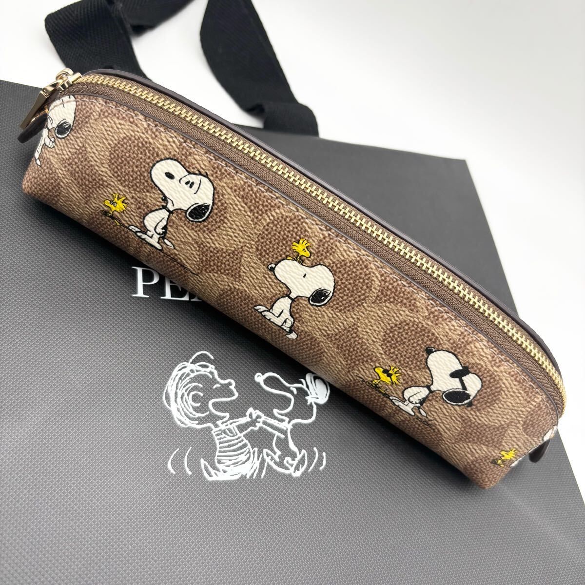 【COACH X PEANUTS】ペンシル ケース・シグネチャー ・スヌーピー！筆箱！
