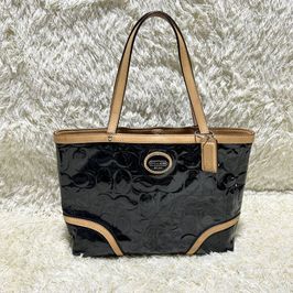 コーチ ポピー マドラス フォールドオーバー ハンドバッグの新品/中古