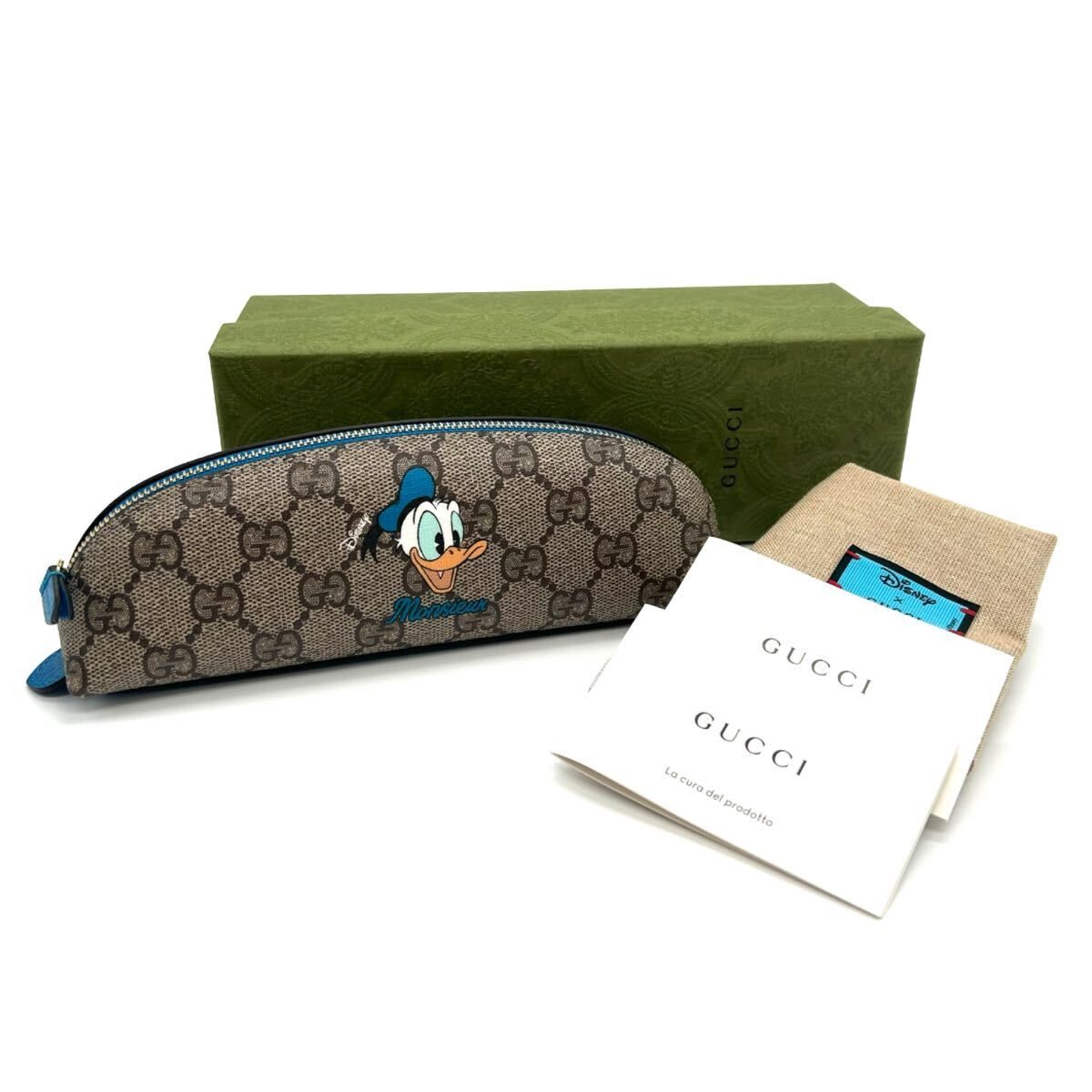 GUCCI グッチ　美品　GGスプリーム　ドナルドダッグ　ペンケース　662129 ディズニー　PVC ドナルド　小物　GG ブルー　プレゼント　